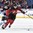 BUFFALO, NEW YORK - DECEMBER 26: Canada's Michael McLeod #20 and Finland's Juha Jaaska #3 battle for the puck during preliminary round action at the 2018 IIHF World Junior Championship. (Photo by Matt Zambonin/HHOF-IIHF Images)

